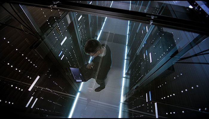 man in server room
