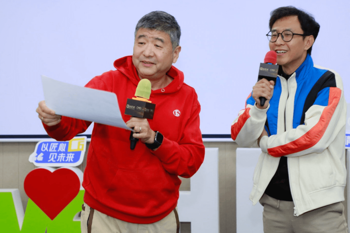 Two men talking with microphones
