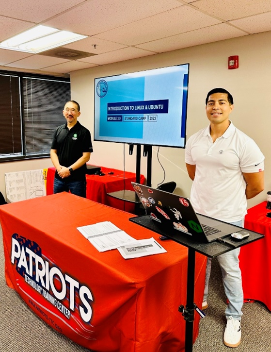 F5 Solution Engineers Sam Park and Ivan Reyes Mendez at the AFA CyberCamp